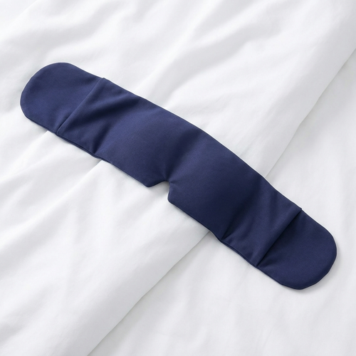 Kyla cooling sleep mask on linen